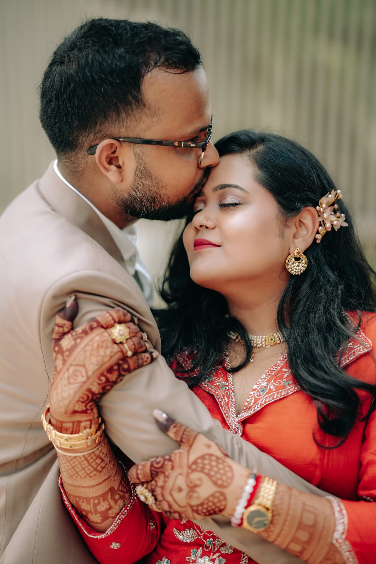 Kunal kissing Survi on the forehead